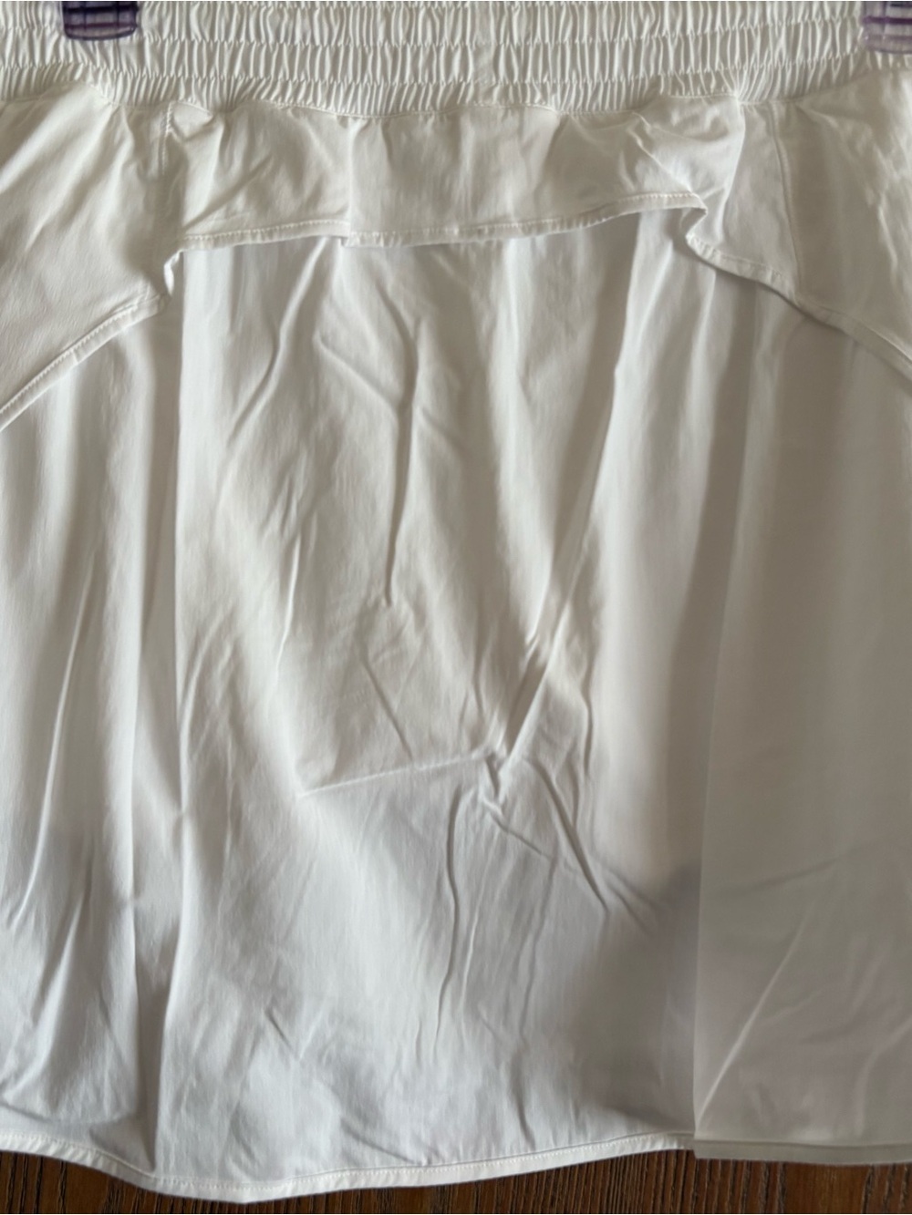 Lululemon White Mini Skirt with Elastic Waist with shorts underneath